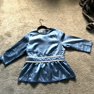 Blue satin peplum with pearl waist